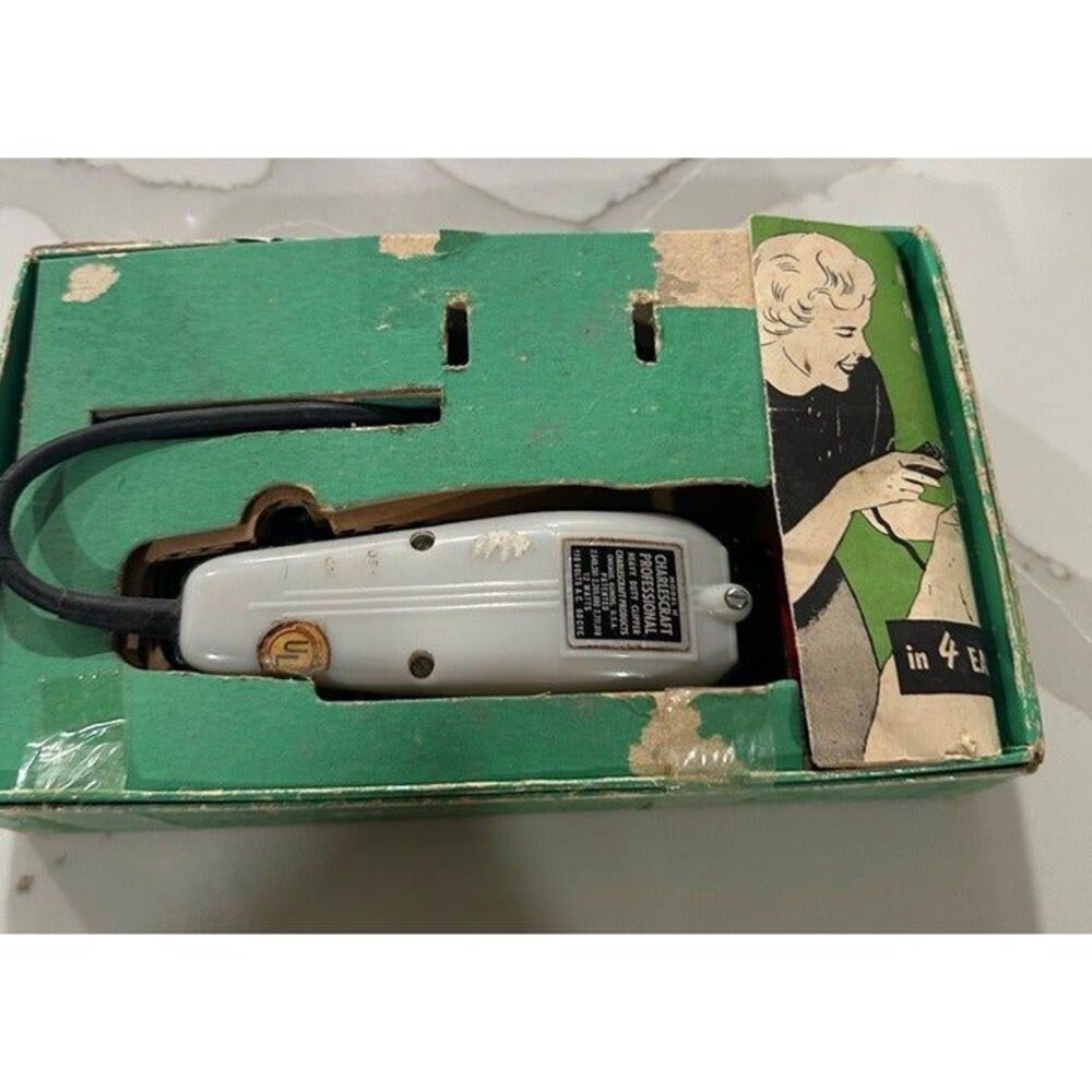 Vintage Charlescraft Professional heavy-duty clippers with a manual.